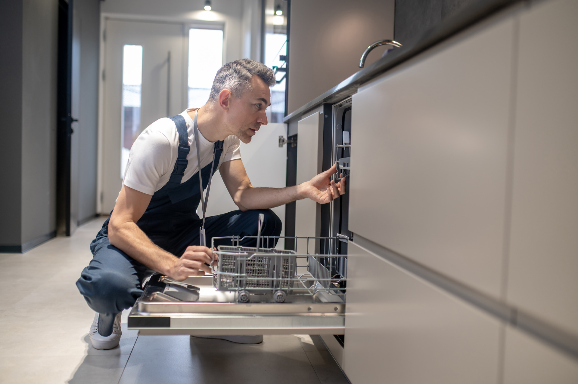 Kitchen Facilities Profile Man Touching Details Kitchen Lit By Daylight 1